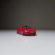 Illustration for article titled Makeitfit Monday: Rennsport Reunion Edition - Malibu International 1:87 Porsche Carrera GT